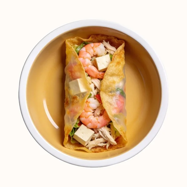 Banh Xeo (Vietnamese Crepe), plated, photographed from above.