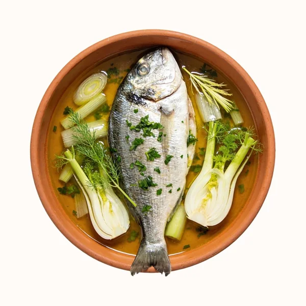 Branzino in Brodo, plated, photographed from above.