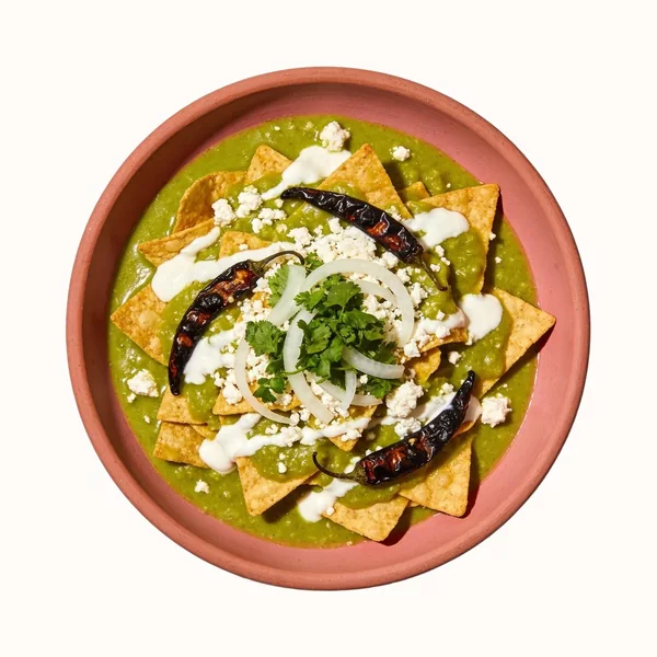Chilaquiles Verdes, plated, photographed from above.