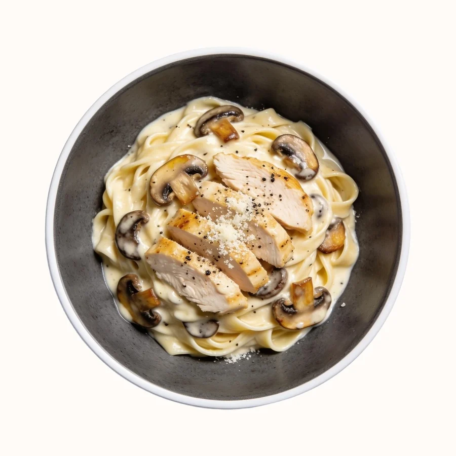 Fettuccine Alfredo, plated, photographed from above.