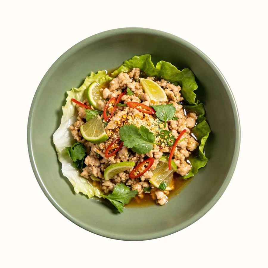 Larb Gai, plated, photographed from above.