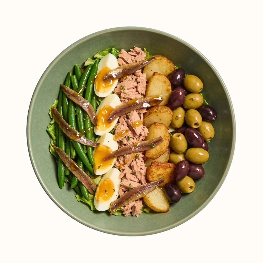 Niçoise Salad, plated, photographed from above.