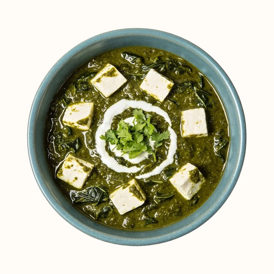 Palak Paneer, plated, photographed from above.
